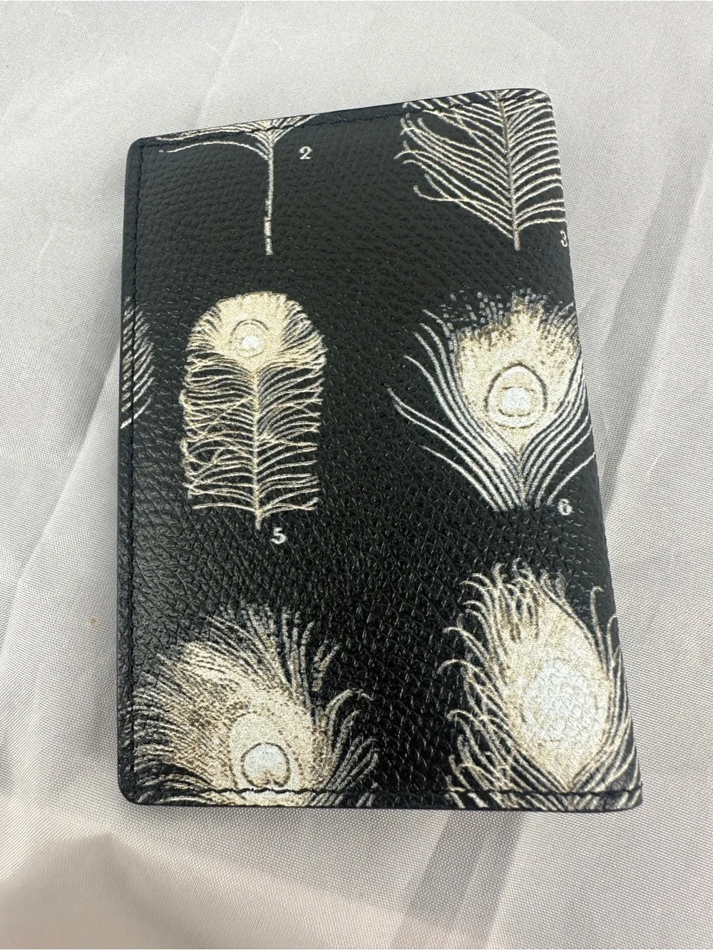 Alexander McQueen black feather bifold walket
